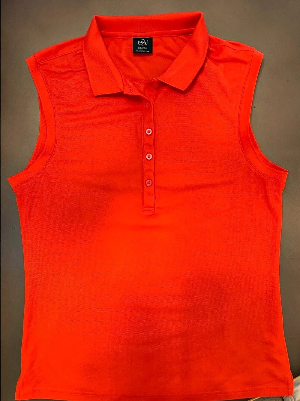 Wilson Staff Ladies Orange Sleeveless Polo Size XL NWOT
Polyester